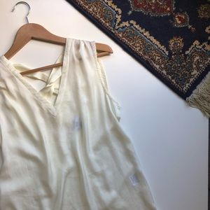 • BAR III • Cream twist back sleeveless top.